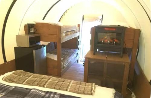 Alton Otro | Whispering Pines Covered Wagons