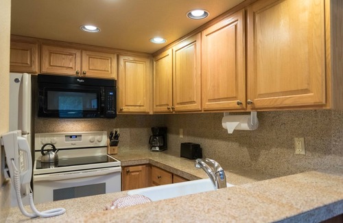 Welches Apartamento | Whispering Woods Resort