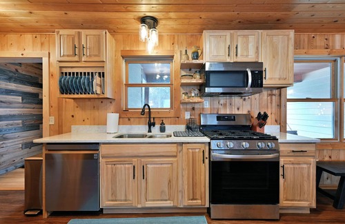 Spooner Casa | Whispering Woods- Spacious 5 bedroom home with sandy frontage near Spooner, WI.