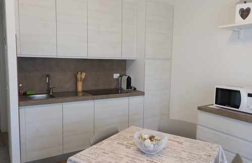 Pirotto Li Frati Apartamento | Apartamento "WHITE & SWEET HOME" frente al mar con piscina