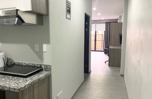 Tamarindo Apartamento | Whitestone Parkview Tamarindo 2 queen bed studio w/kitchen 7 min walk to beach