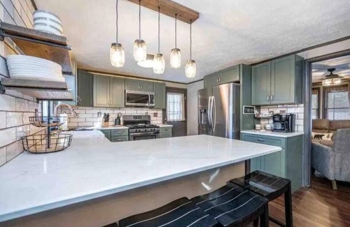 McHenry Casa | Wisp-ering Hideaway: 5 min to Wisp, covered hot tub, 2 firepits, Dogs, Arcade!