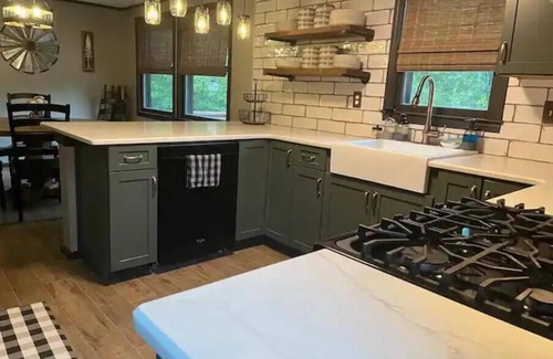 McHenry Casa | Wisp-ering Hideaway: 5 min to Wisp, covered hot tub, 2 firepits, Dogs, Arcade!