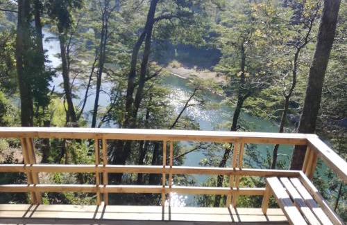 Pucon Casa | Wonderful rustic cabin 2, with native logs, on the banks of the Trancura River