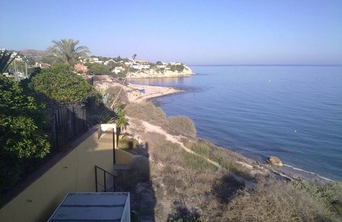 Coveta Fuma Casa | Maravillosa villa con playa privada, vistas al mar, piscina compartida, terraza y Wi-Fi