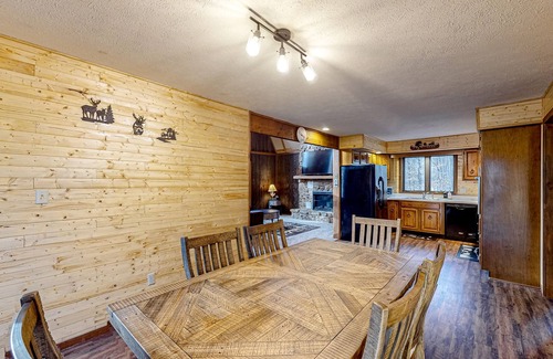 Gnaw Bone Casa | Wooded acreage with wrap-around deck, hot tub, central AC, & game room