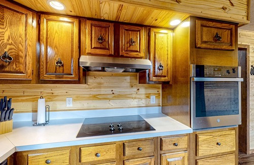 Gnaw Bone Casa | Wooded acreage with wrap-around deck, hot tub, central AC, & game room