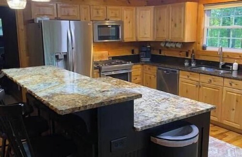 Rock Island Cabina | Wooded Cabin on Rocky River