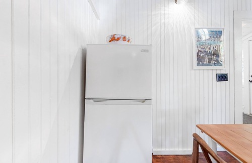 Camden Cabaña | Wooded home on the pond with WiFi, wood stove, full Kitchen, loft, bunks, & dock