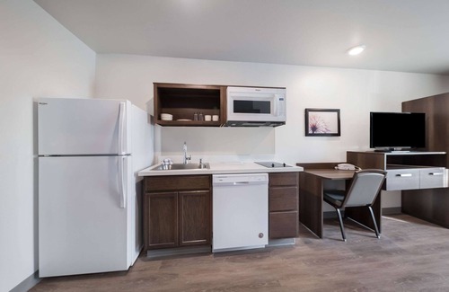 Plano Hotel | WoodSpring Suites Dallas Plano Central Legacy Drive