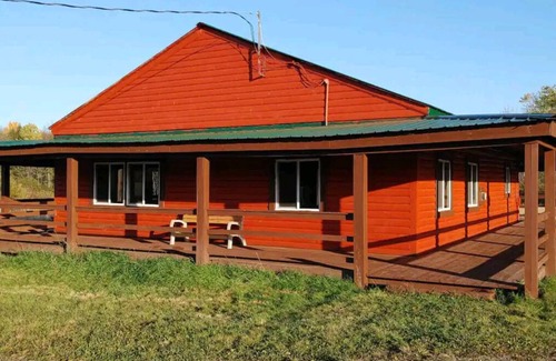 Gerry Cabina | Woodys Retreat this rental includes the barn outdoor covered fire pit