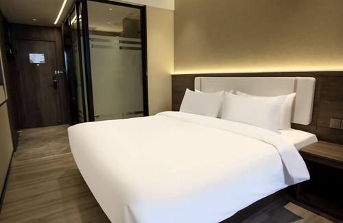 Decheng District Hotel | World Smart Hotel Dezhou Railway Station
