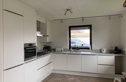 Indijk Villa | Woudsend: Casa familiar de lujo para 8 personas. en el agua!