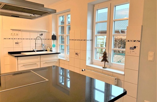 Epenwohrden Apartamento | Wunderschöne Ferienwohnung mit Kamin und Großem Garten an der Nordsee