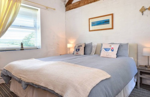 Llanengan Casa | Una de las cuatro casas de vacaciones en Bwlch Farm, Y Stabl es una conversión de piedra fabulosa que conserva el ori