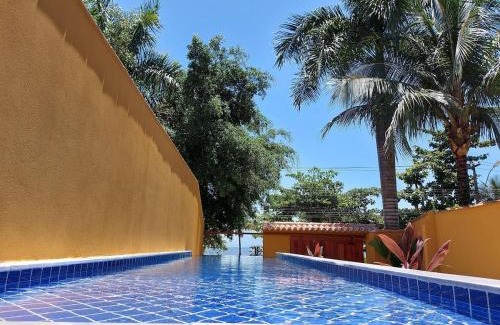 Jabaquara Casa | Yara - 4 suítes , Frente Praia, piscina em raia, Churrasqueira, Garagem, Wi-Fi