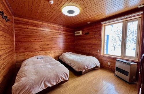 Toyako Casa | Yellow House by Lake TOYA