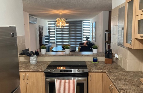 El Combate Condominio | Your Cozy Combate beach retreat, 2 bed/2bath, full A/C, free laundry