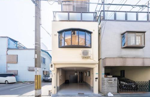 Minato Villa | 真 Private accommodation with sauna, close to USJ and Expo Park, free parking, 4 bedrooms, 8 beds, 2 bathrooms