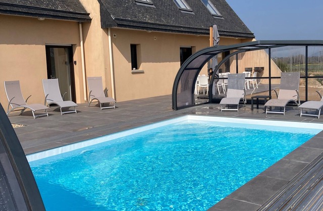 14-person villa with sea view and heated indoor pool.