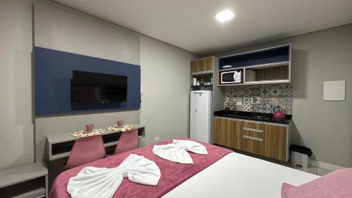 14- Studio decorado com ótima localização!