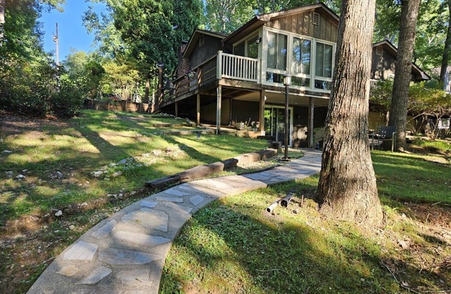 2 to 3 Night Minimum Year 'Round! Enchanted lakefront home with 1 level living! Come Visit "Cove Co