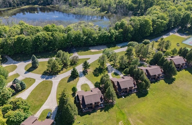 2BR Condo with Fireplace, Balcony, & Lakefront Access at The Rushes