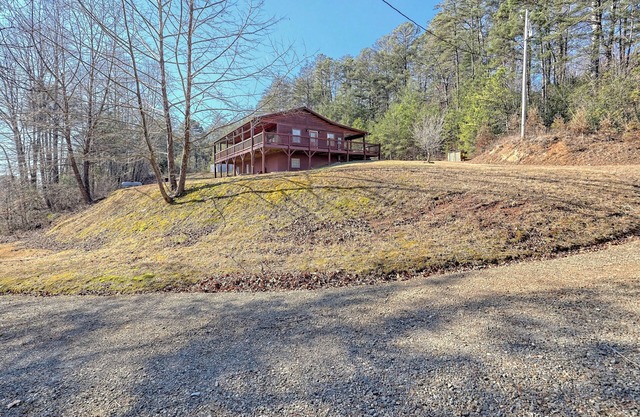 A cozy and bright cabin w/ firepit close to many activities in the Smokies!
