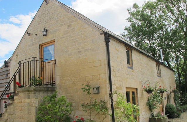 Un espacioso apartamento en el primer piso ubicado dentro de Barn Conversion