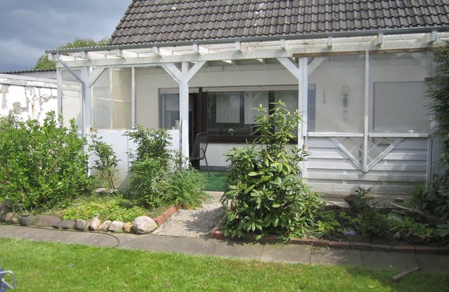 Toda una casa con un jardín para sus vacaciones