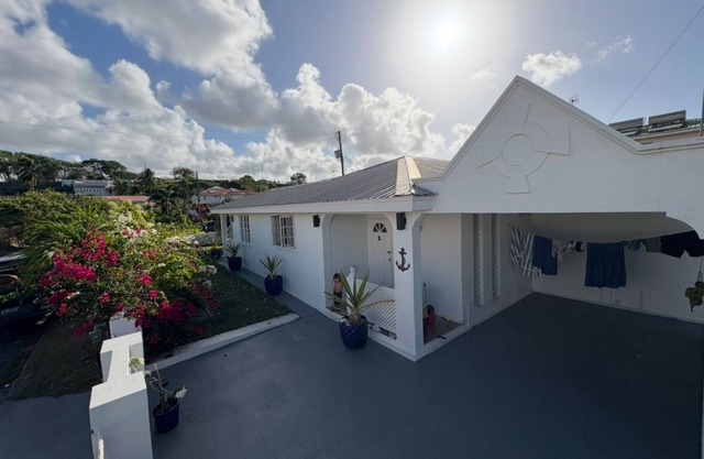 Anchor Villa , 4 bedroom single family home Steps to the beach .