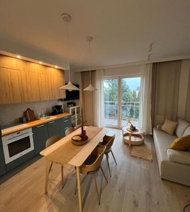Apartament Morska Melodia z balkonem i miejscem do pracy zdalnej