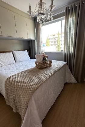Apartamento sofisticado com garagem no centro
