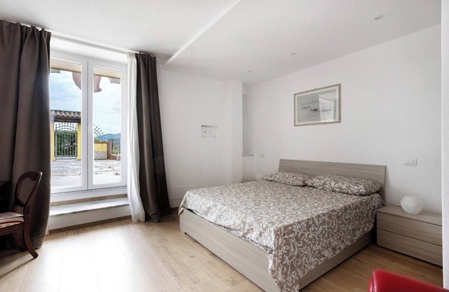 Apartamento 'Casa Marisa' con jardín privado, Wi-Fi y aire acondicionado