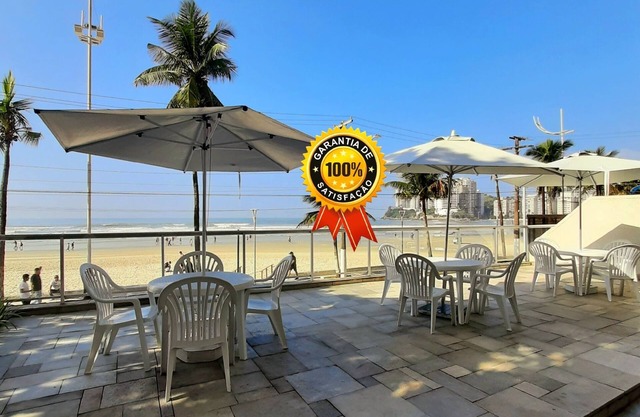 Apto en Guarujá, frente a la playa, servicio de playa, wifi, aire acondicionado, garaje