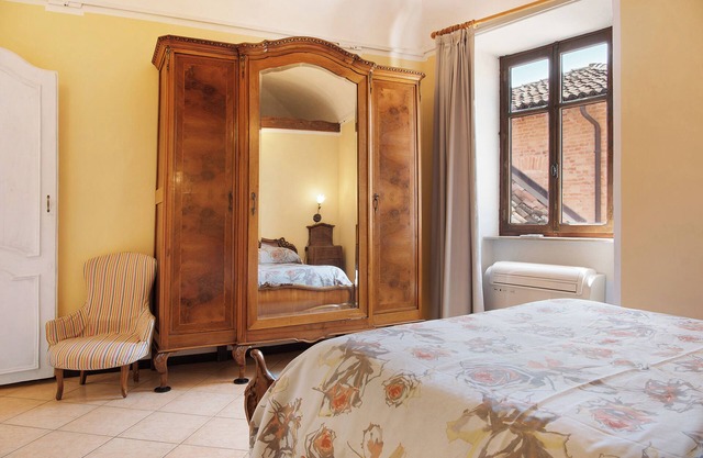 Apartamento 'La Rocca di Efisio - Grignolino' con balcón, Wi-Fi y aire acondicionado