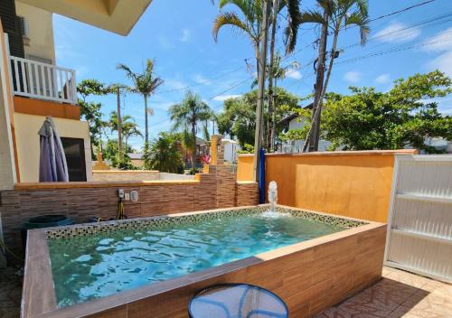 ATAMI STAY Casa em Condomínio com Piscina Aquecida a 1 Quadra do Mar