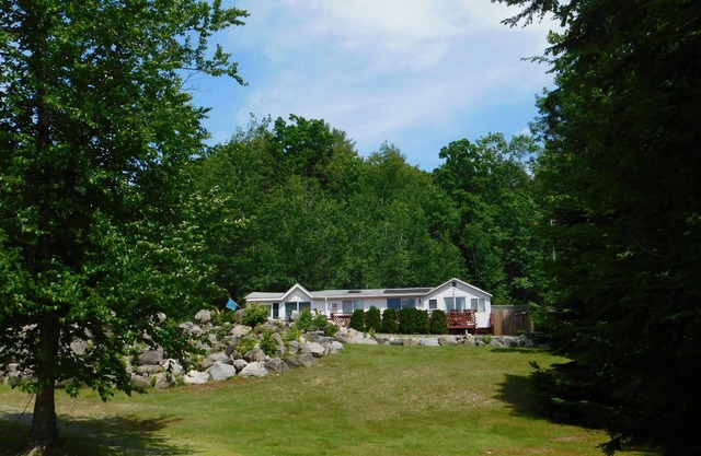 **SUMMER SPECIAL** Brandy Pond oasis w/ large lawn and beautiful sandy beach!