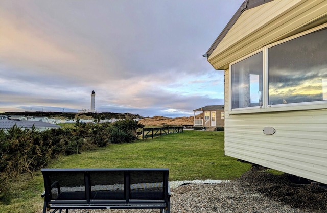 Aurora on the Dunes: Coastal Stay Near West Beach with Lighthouse View!