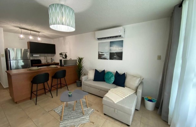 Relax at Bahía Real – Poolside Balcony Escape