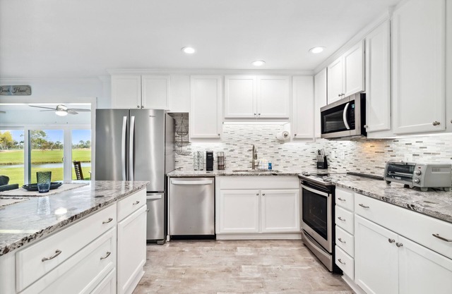 Bay Point Golf Villas by Book that Condo