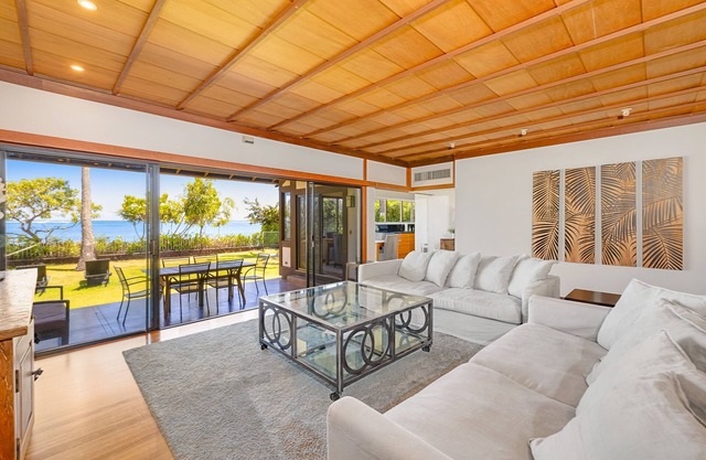 Beachfront home with private hot tub, game room, beach views, grill, lanai