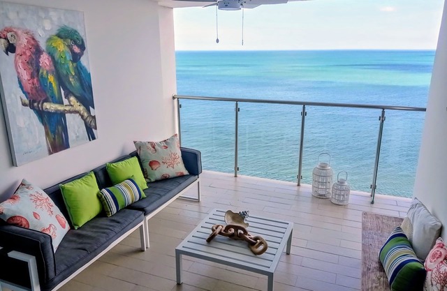 Beautiful apt on the beach, with wonderful cross breezes to keep you cool
