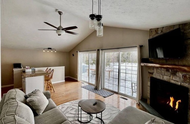Lakefront! Private, flat, sandy beach. Fire pit. Parking. Two living areas.
