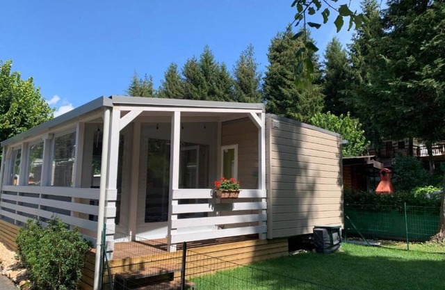 Bungalow 'Casa Mobile 5' con terraza privada, jardín privado y aire acondicionado