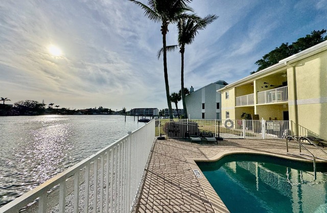 Canal-View Gem w/ Pool in Treasure Island Paradise