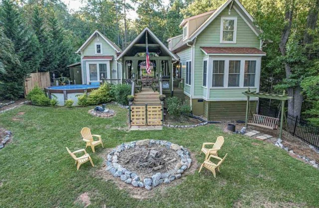 Tranquil Lakefront Cottage with Dock, Pool, & Game Room