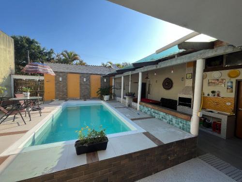 Casa de Praia com Piscina Mesa de Sinuca e Ar Condicionado | RELAX IMÓVEIS