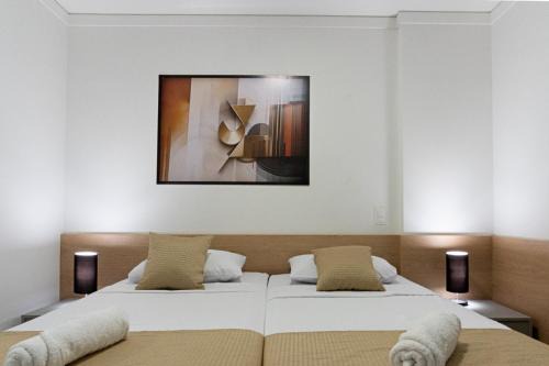 Central novo 2 quartos com Ar- Q e F home office