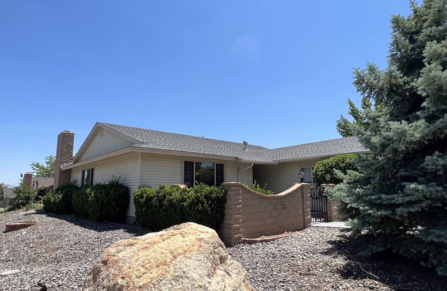 Centrally located to everything Reno! Family home w/ arcade games & full patio.